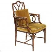 AN AESTHETIC CARVED ARMCHAIR A