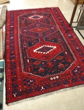 AN AFGHAN BELOUCH CARPET featu