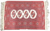 AN AFGHAN BOKHARA CARPET An Af