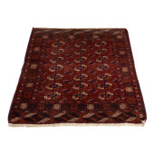 AN AFGHAN BOKHARA CARPET<br>An