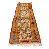 AN AFGHAN WAR CARPET RUNNER An