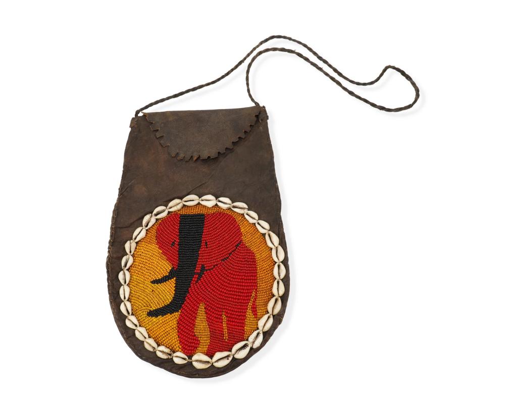 AN AFRICAN BEADED PICTORIAL HIDE