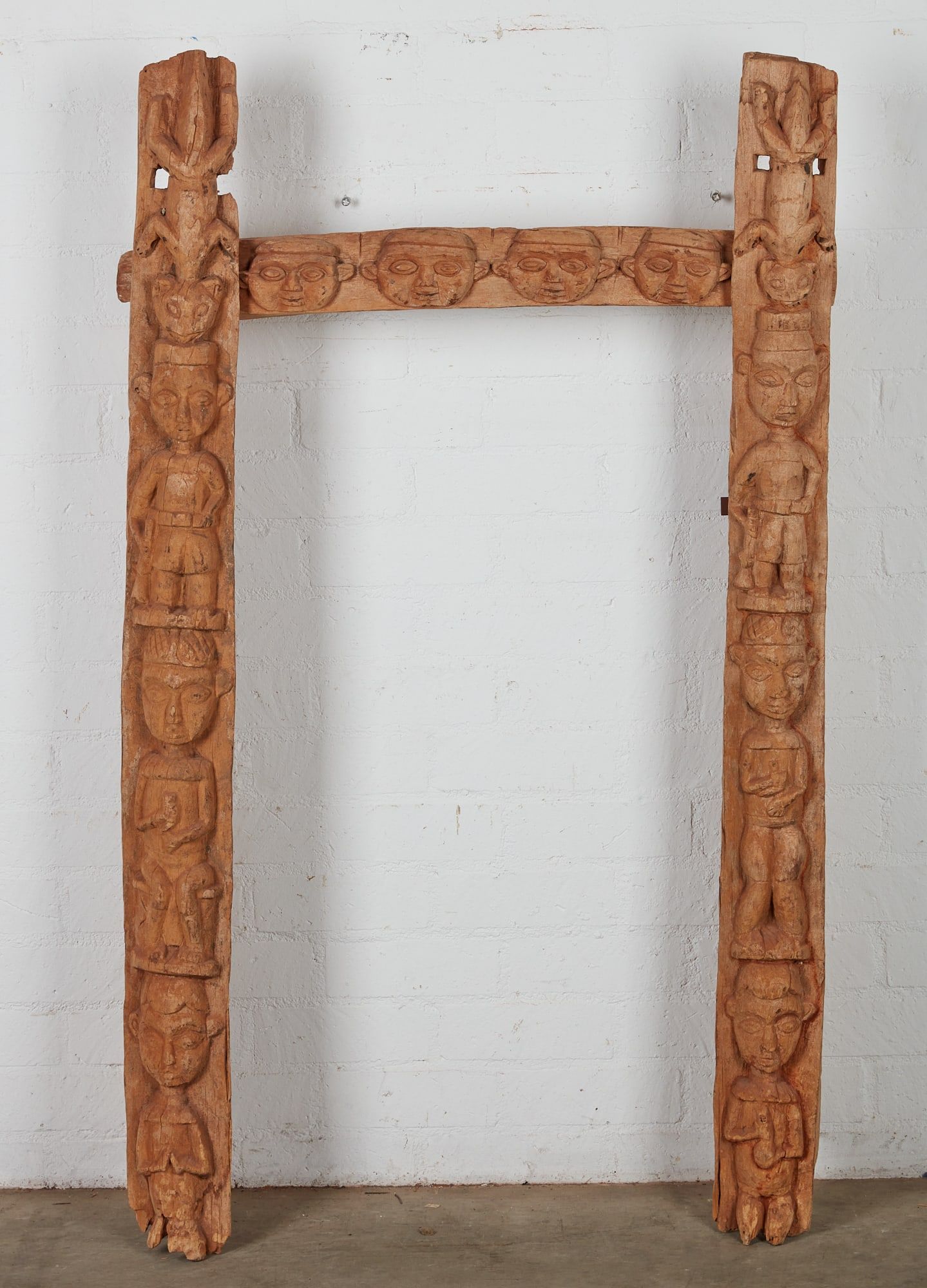 AN AFRICAN CARVED WOOD DOOR