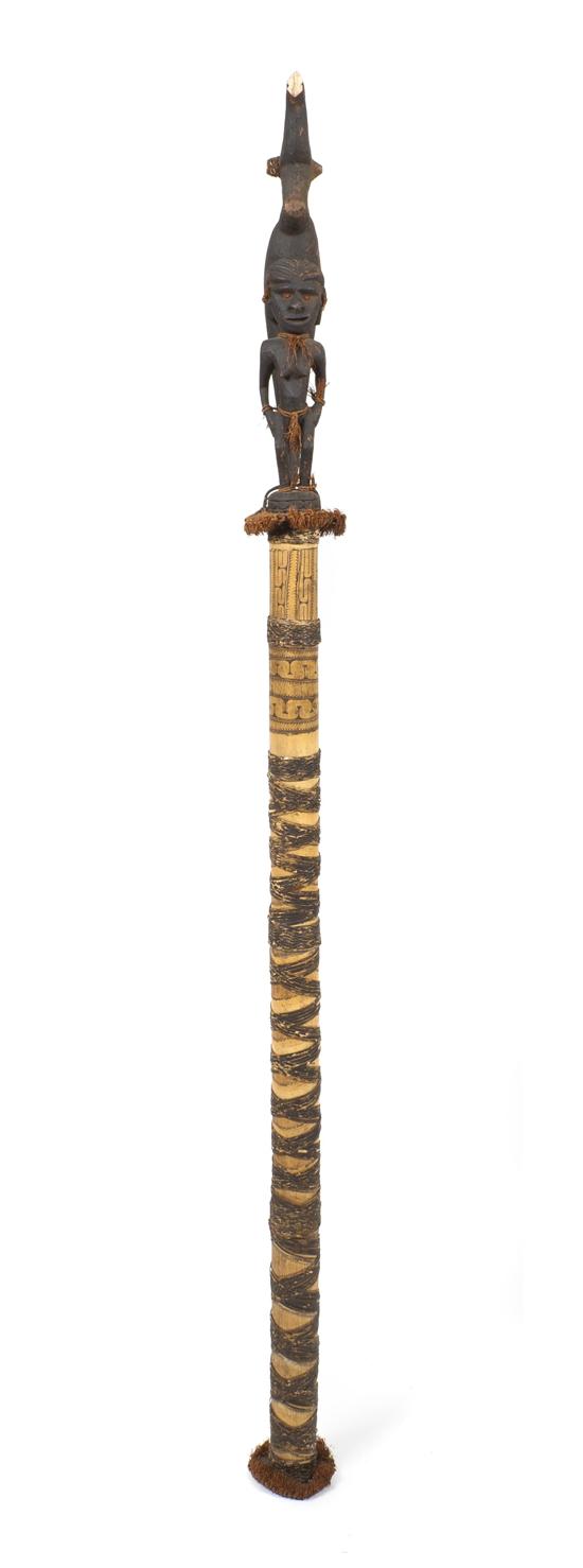 An African Carved Wood Figural