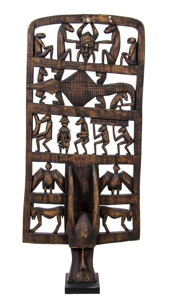 *An African Carved Wood Mask with a
