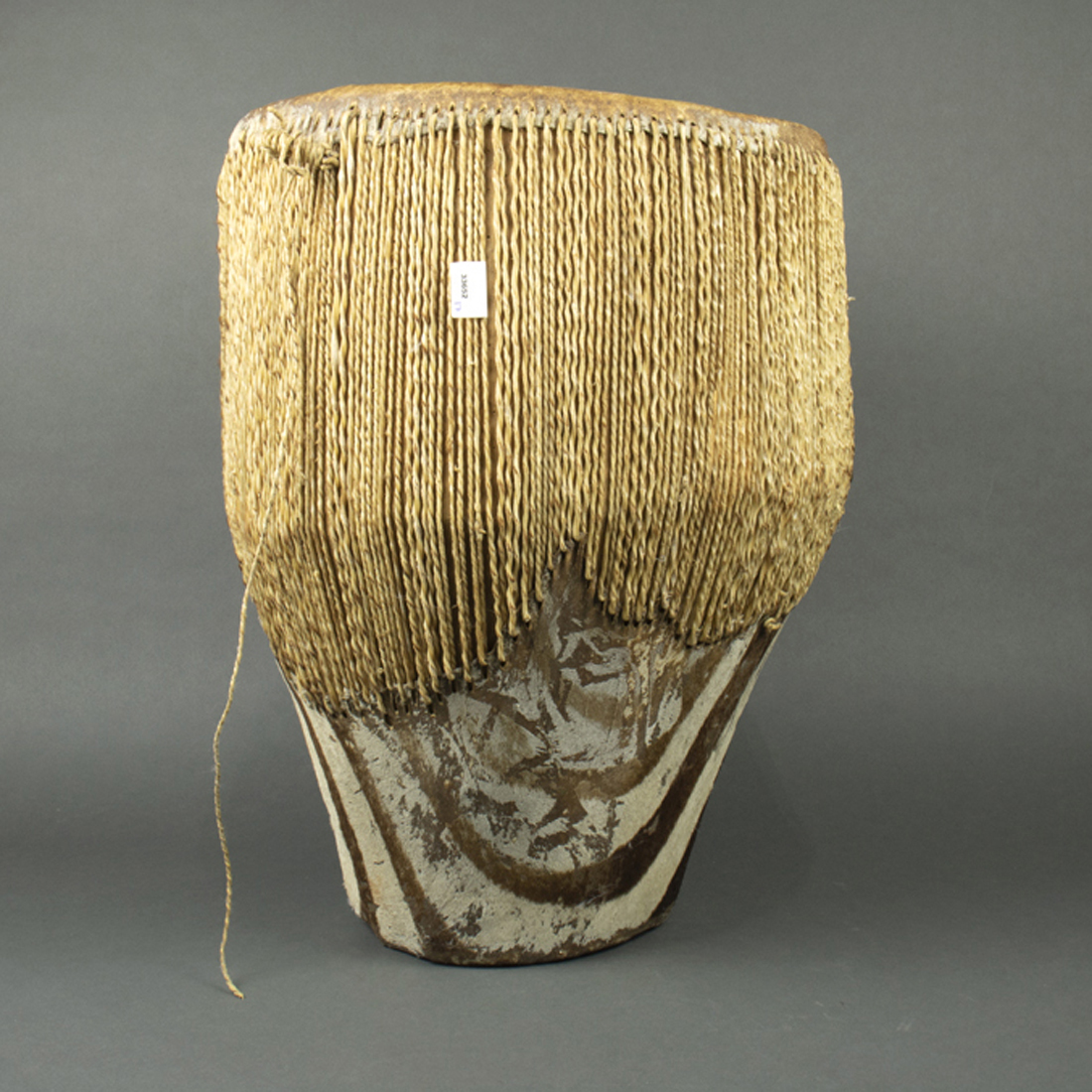 AN AFRICAN CONGA DRUM FASHIONED OUT