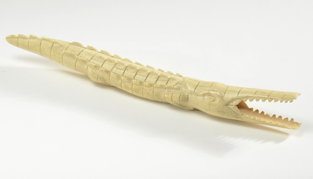 AN AFRICAN HAND CARVED IVORY