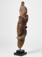 AN AFRICAN TRIBAL CARVED WOOD