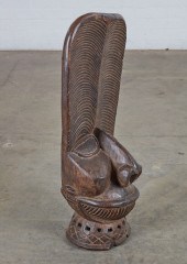 AN AFRICAN TRIBAL CARVED WOOD