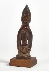 AN AFRICAN TRIBAL CARVED WOOD