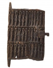 AN AFRICAN TRIBAL GRANARY DOOR