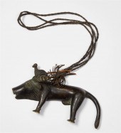 AN AFRICAN TRIBAL METAL BUFFAL
