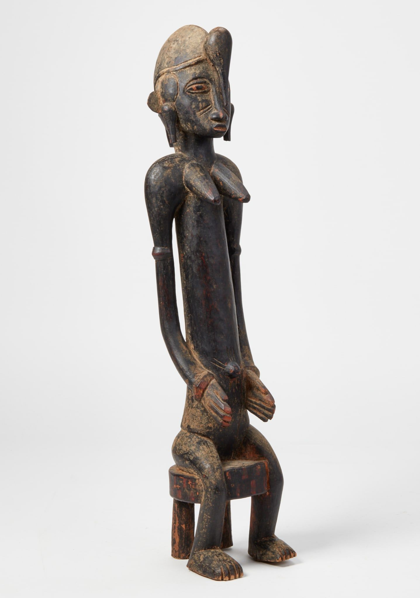 AN AFRICAN TRIBAL WOOD FEMALE