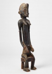 AN AFRICAN TRIBAL WOOD FEMALE