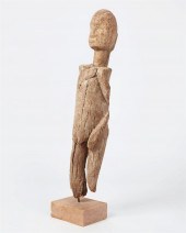 AN AFRICAN TRIBAL WOOD FIGURE,