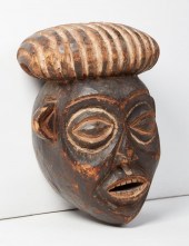 AN AFRICAN TRIBAL WOOD MASK, P