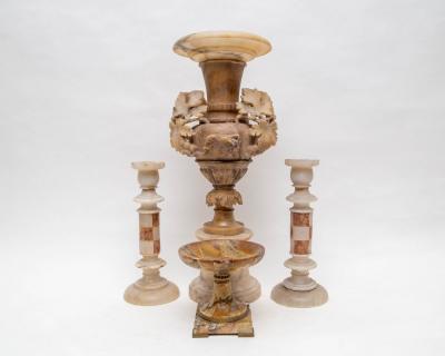 An alabaster urn-shaped vase with