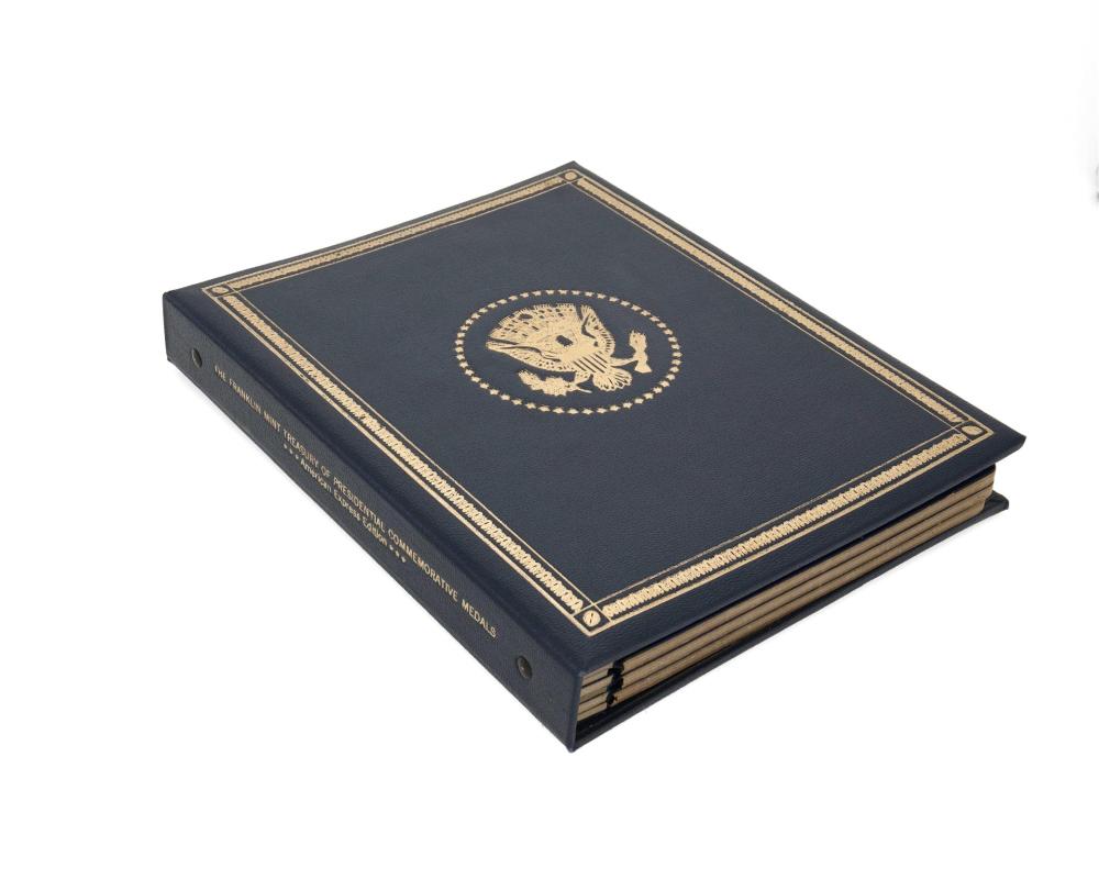 AN ALBUM OF FRANKLIN MINT