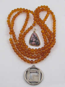 An amber necklace a silver