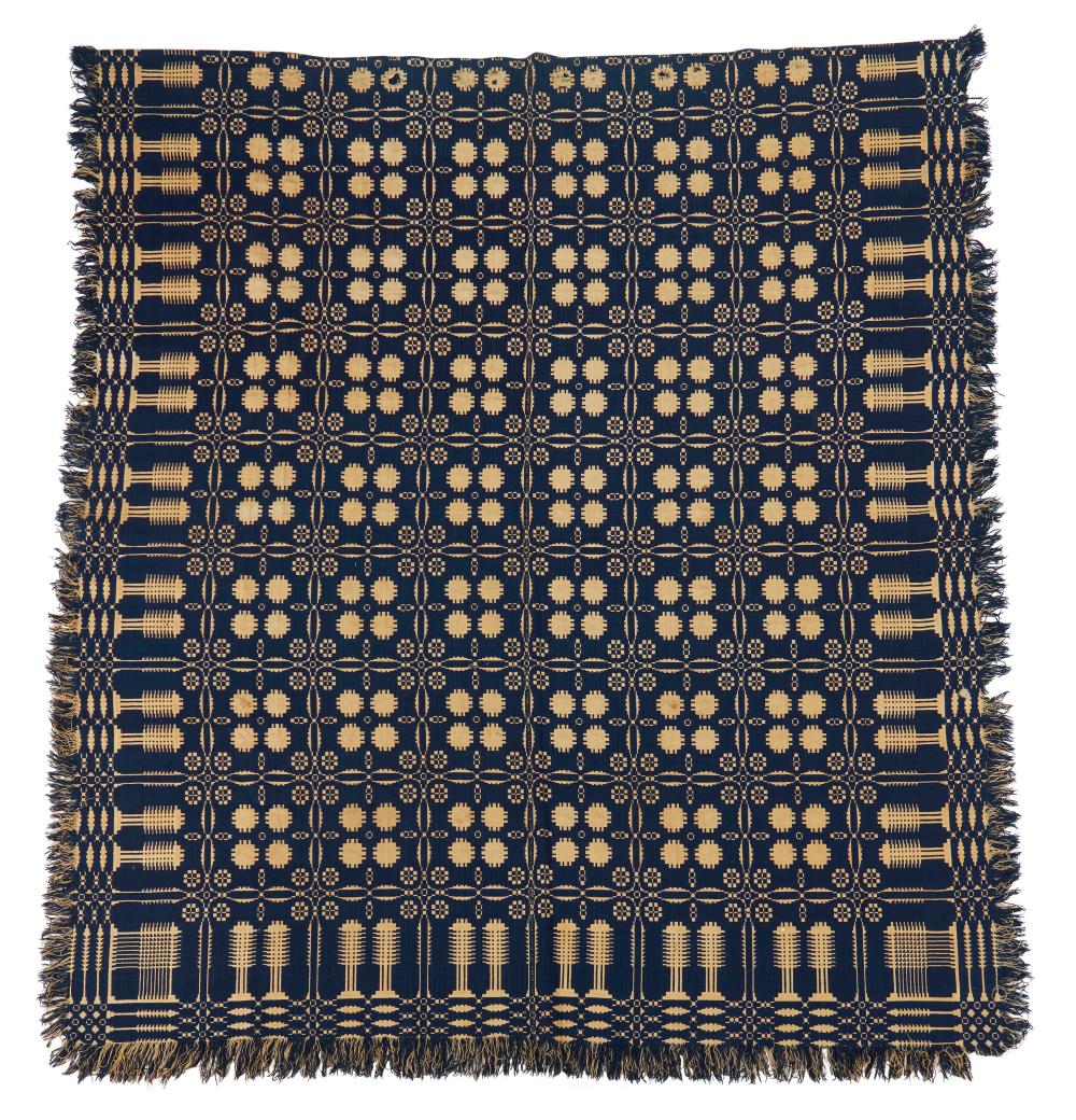 AN AMERICAN BLUE AND WHITE WOVEN