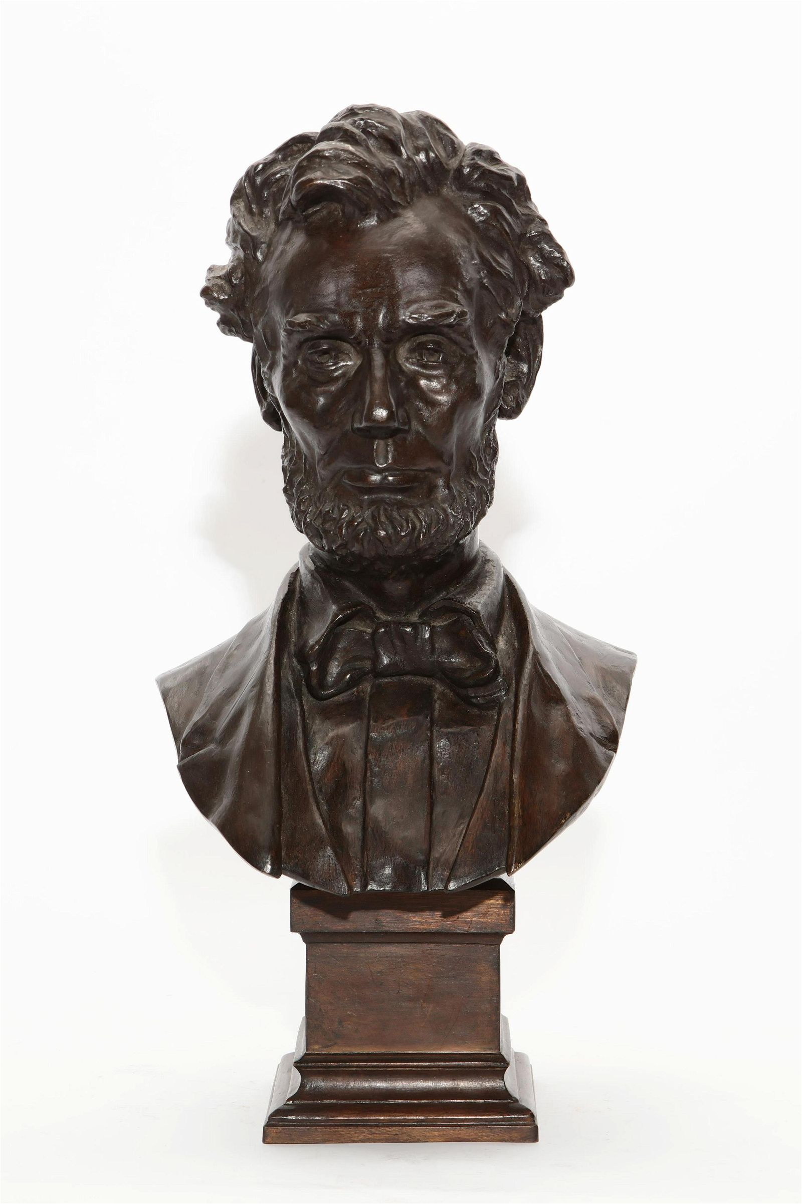 AN AMERICAN BRONZE PORTRAIT BUST OF