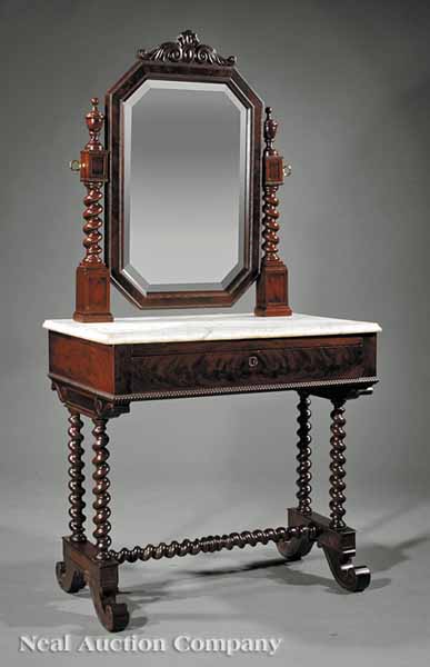 An American Carved Mahogany