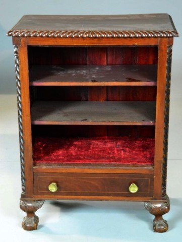 An American Carved Walnut And