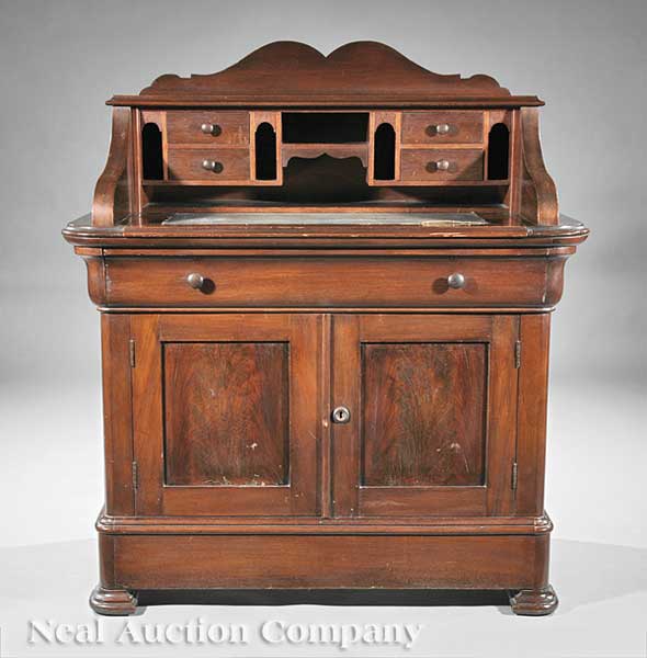 An American Carved Walnut Desk
