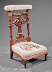 An American Carved Walnut Prie