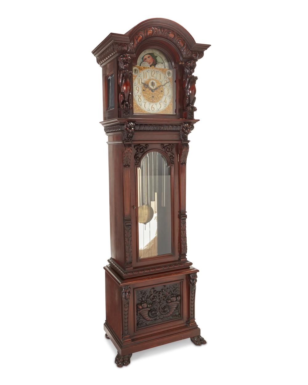 AN AMERICAN CARVED WOOD TALL CASE