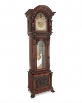 AN AMERICAN CARVED WOOD TALL C