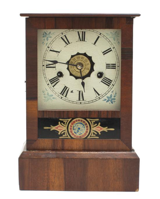 An American Eglomise Clock having a