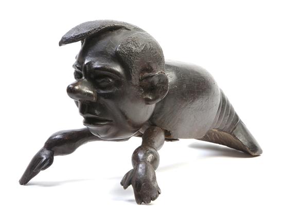*An American Folk Art Carved Walnut