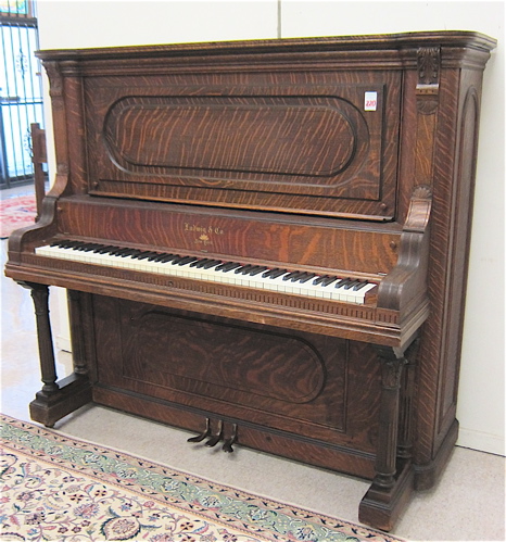 AN AMERICAN OAK UPRIGHT GRAND PIANO