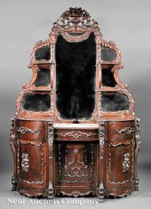 An American Rococo Carved Maho