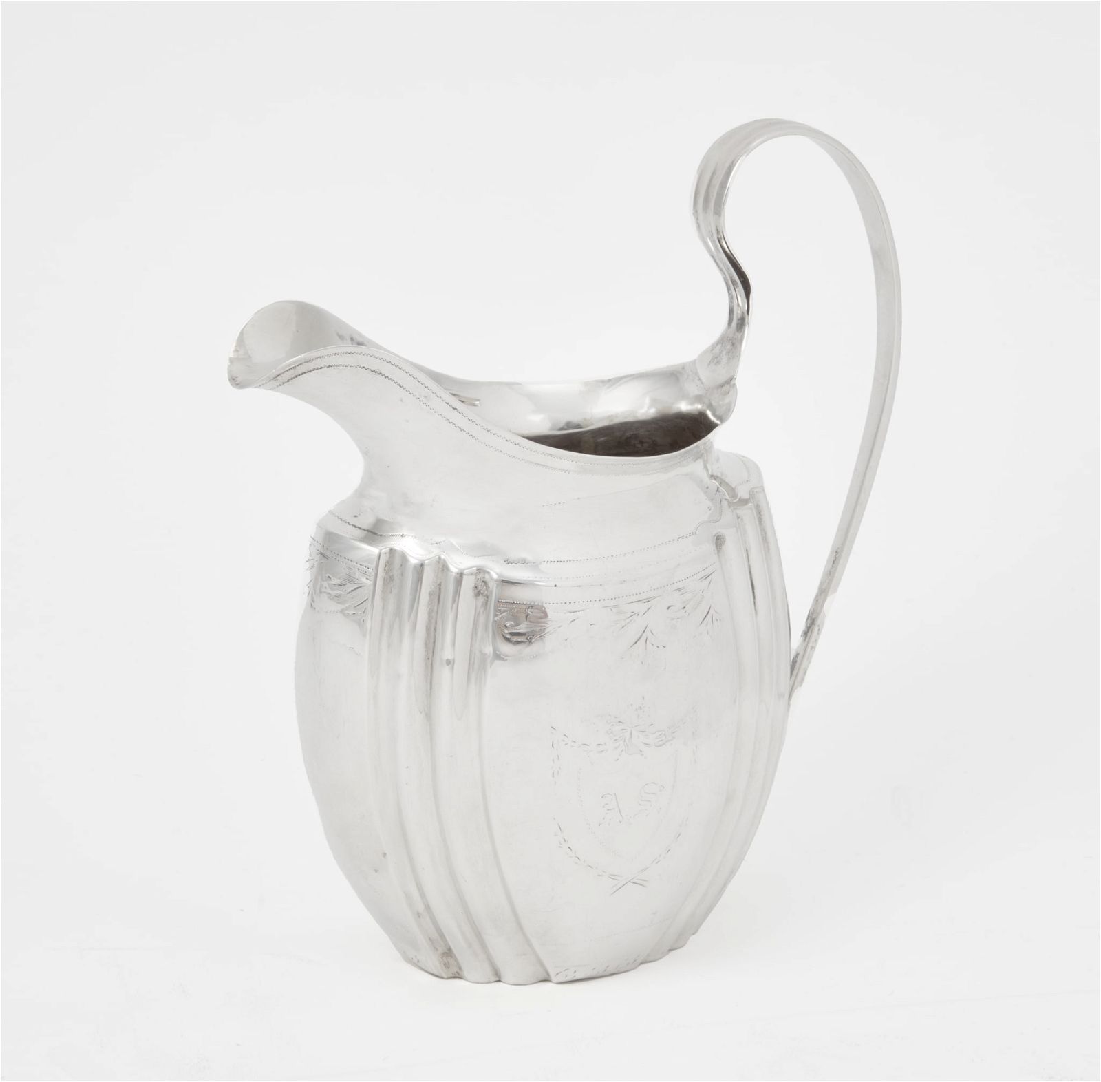 AN AMERICAN SILVER CREAM JUG, 