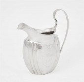 AN AMERICAN SILVER CREAM JUG,