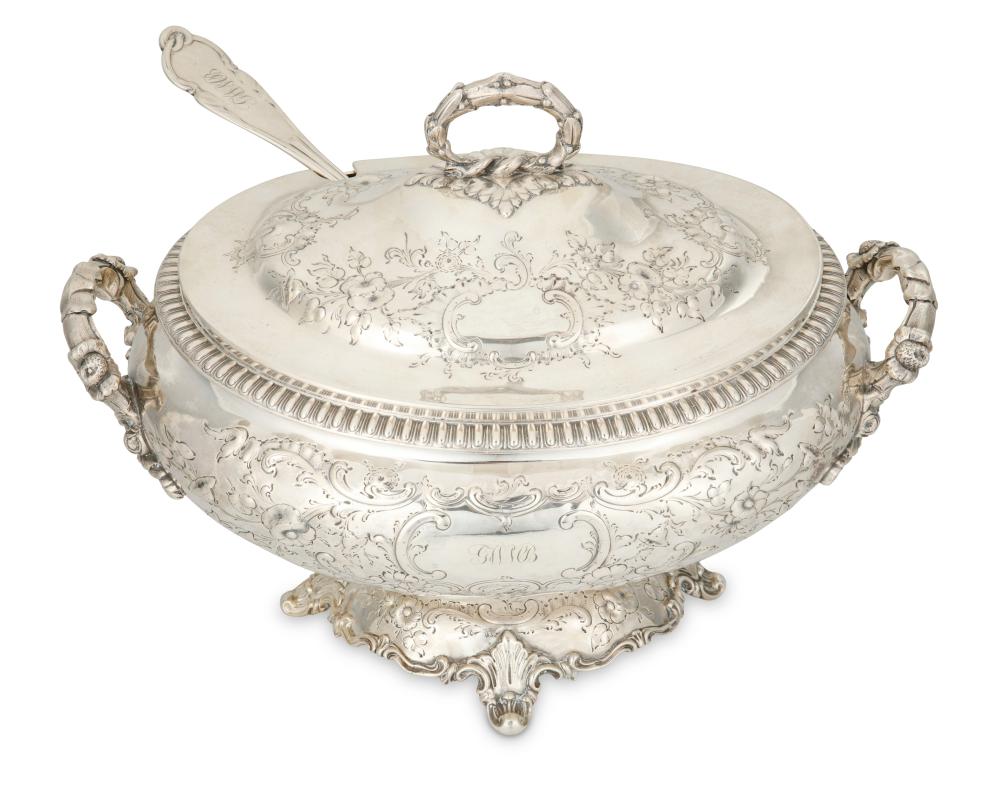 AN AMERICAN SILVER LIDDED