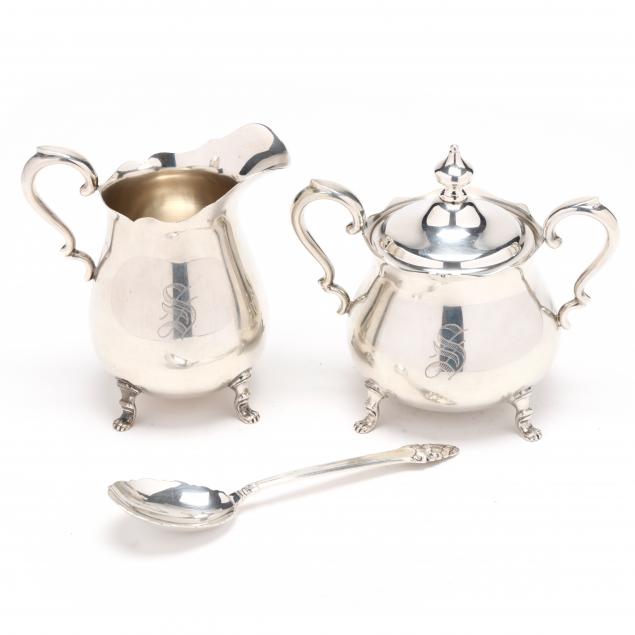 AN AMERICAN STERLING SILVER CREAMER