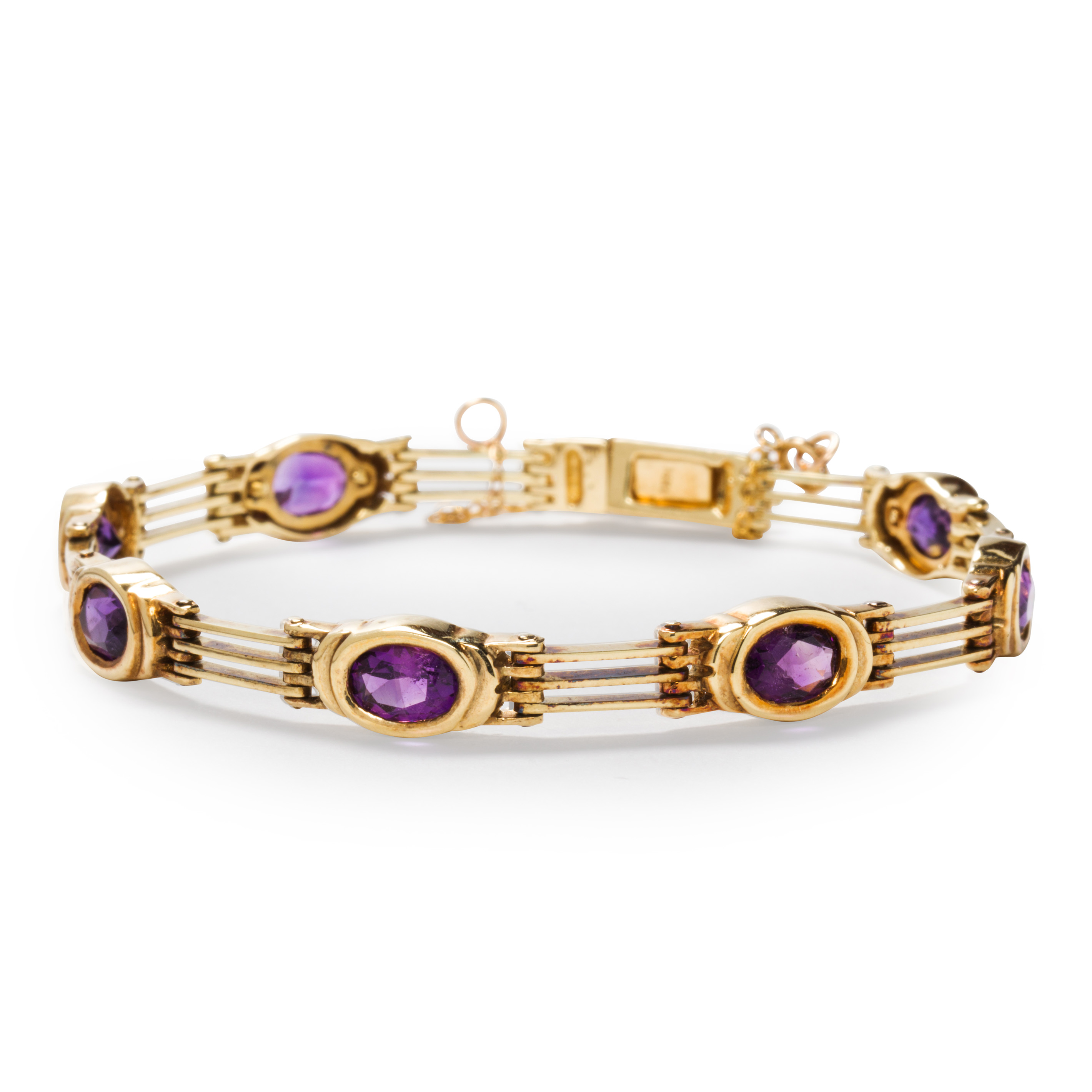 AN AMETHYST AND FOURTEEN KARAT GOLD