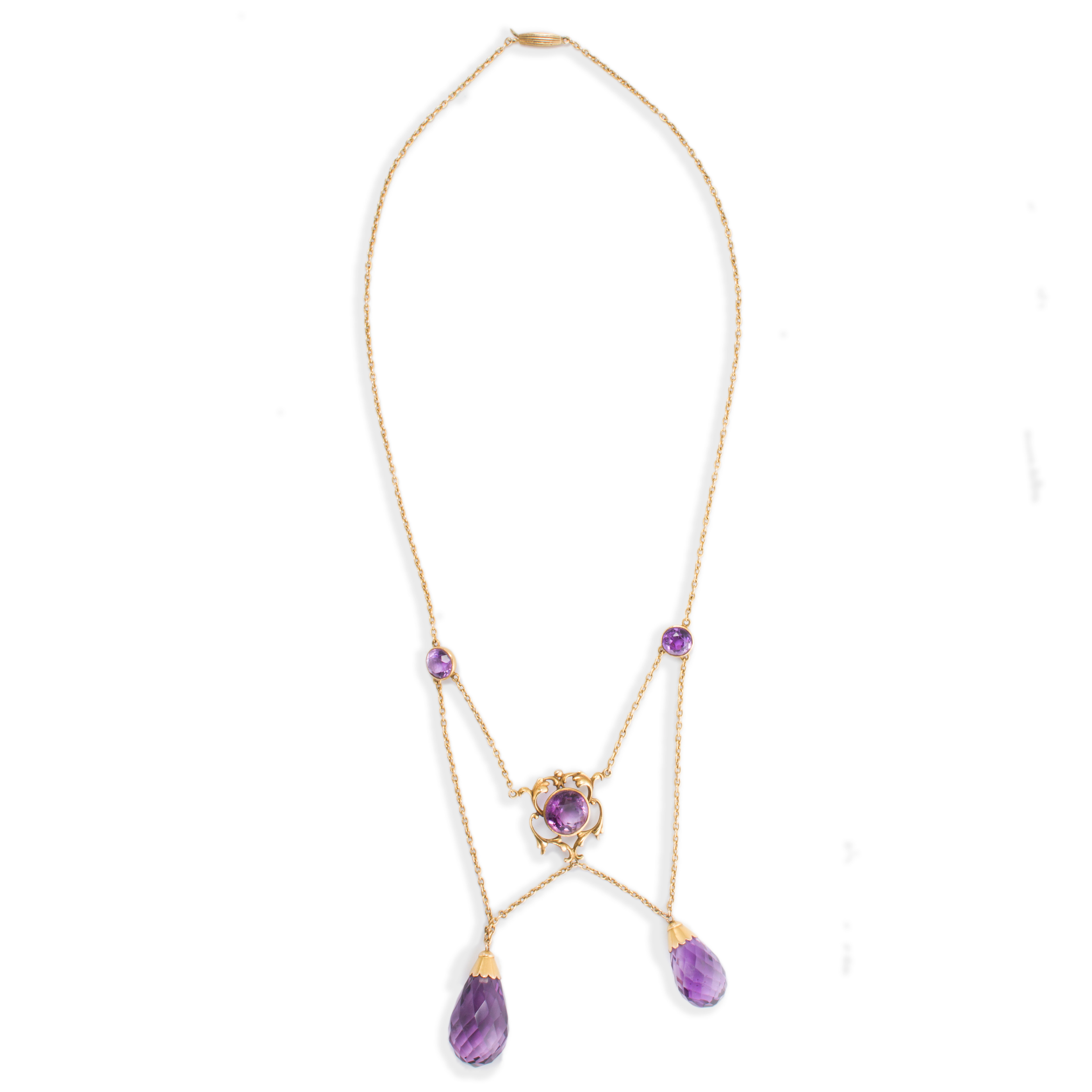 AN AMETHYST AND FOURTEEN KARAT GOLD