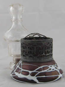 An amethyst coloured art glass vase