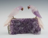 An Amethyst Geode with Two Car