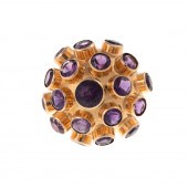 AN AMETHYST "SPUTNIK" RING IN