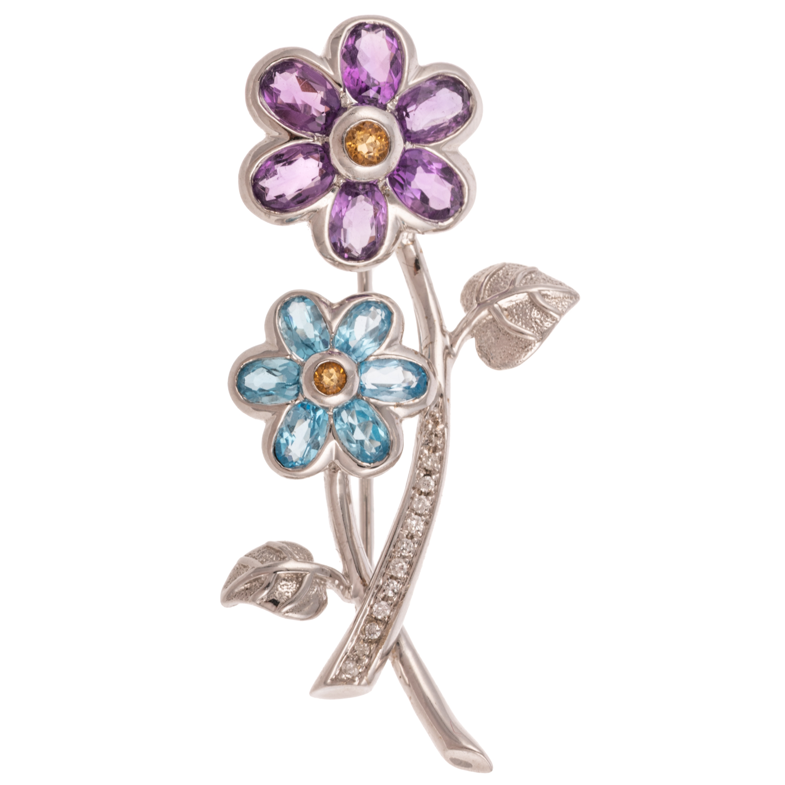 AN AMETHYST & TOPAZ FLOWER BROOCH