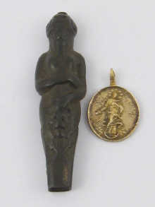 An ancient bronze knife handle