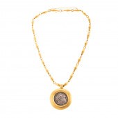 AN ANCIENT GREEK COIN IN 22K B