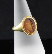 An ancient intaglio set in a m