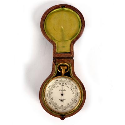 An aneroid barometer, thermometer