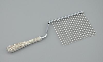 An Angelfood Cake Slicer With A